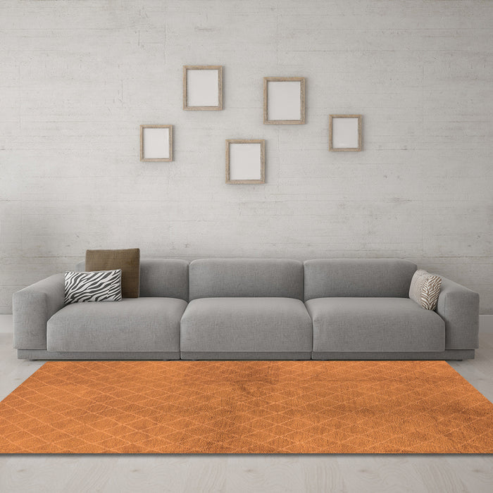 Machine Washable Solid Orange Modern Area Rugs in a Living Room, wshurb600org