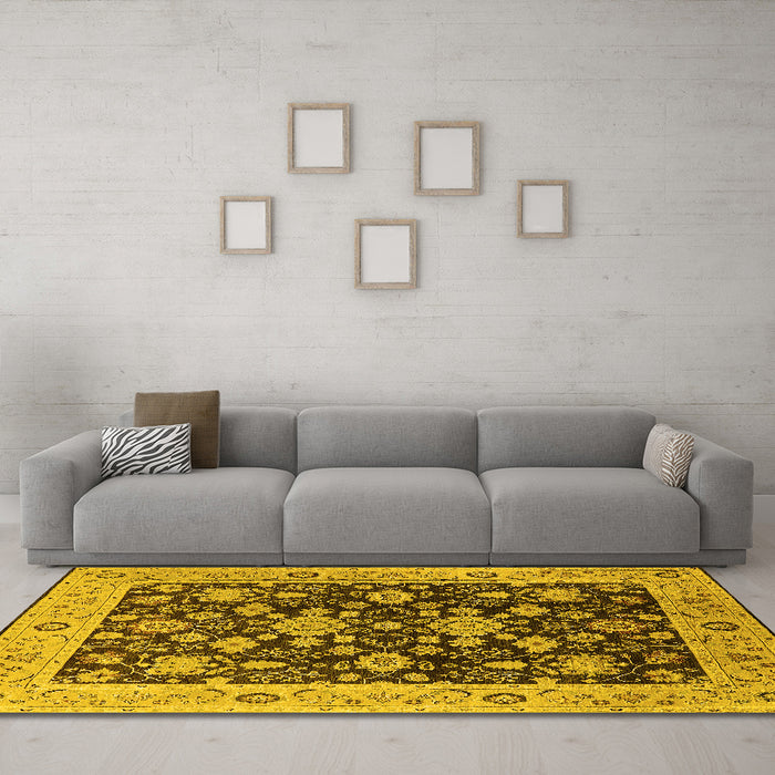 Machine Washable Oriental Yellow Traditional Rug in a Living Room, wshurb608yw