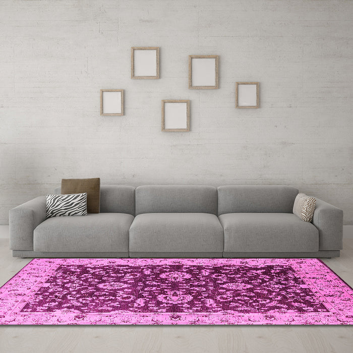 Machine Washable Oriental Pink Traditional Rug in a Living Room, wshurb620pnk