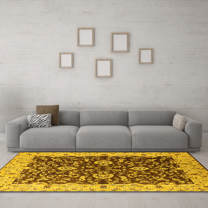 Machine Washable Oriental Yellow Traditional Rug in a Living Room, wshurb620yw