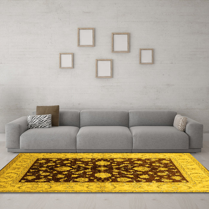 Machine Washable Oriental Yellow Traditional Rug in a Living Room, wshurb621yw