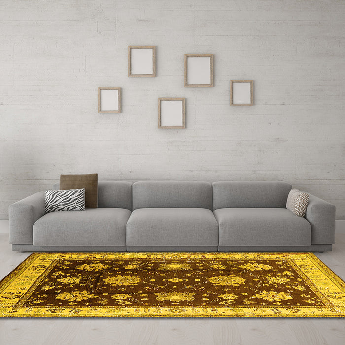 Machine Washable Oriental Yellow Traditional Rug in a Living Room, wshurb624yw