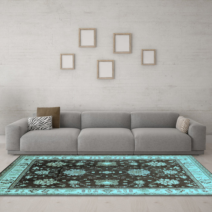 Machine Washable Oriental Light Blue Traditional Rug in a Living Room, wshurb624lblu