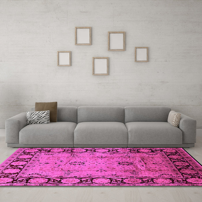 Machine Washable Oriental Pink Traditional Rug in a Living Room, wshurb629pnk