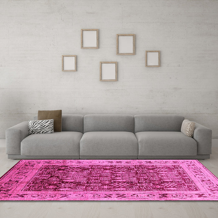 Machine Washable Oriental Pink Traditional Rug in a Living Room, wshurb690pnk