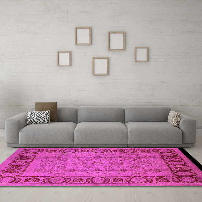 Machine Washable Oriental Pink Traditional Rug in a Living Room, wshurb691pnk