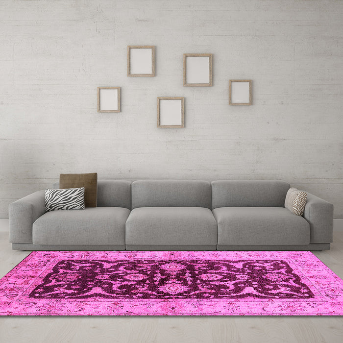 Machine Washable Oriental Pink Traditional Rug in a Living Room, wshurb709pnk