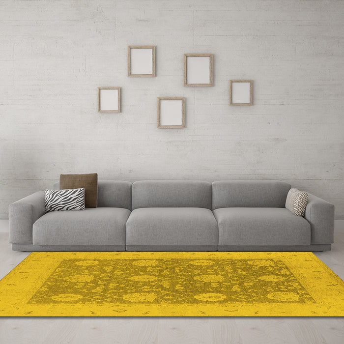 Machine Washable Oriental Yellow Traditional Rug in a Living Room, wshurb797yw