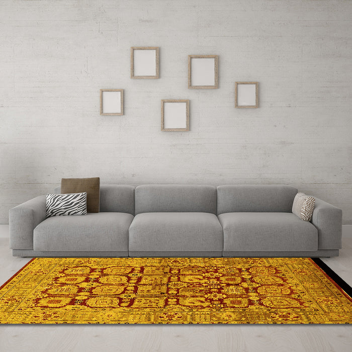 Machine Washable Oriental Yellow Traditional Rug in a Living Room, wshurb909yw