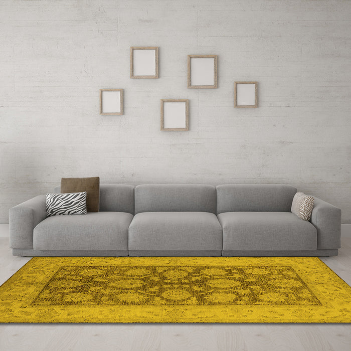 Machine Washable Oriental Yellow Traditional Rug in a Living Room, wshurb914yw