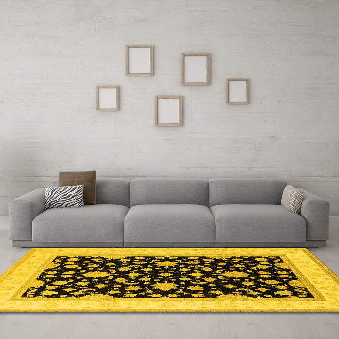 Machine Washable Oriental Yellow Traditional Rug in a Living Room, wshurb984yw