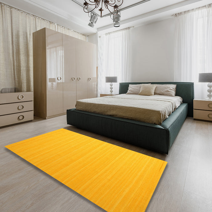 Contemporary Deep Yellow Modern Rug in a Bedroom, con1002