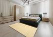 Contemporary Brown Gold Solid Rug in a Bedroom, con1140