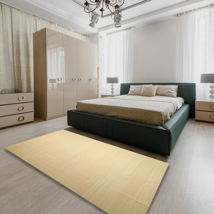 Contemporary Brown Gold Solid Rug in a Bedroom, con1251