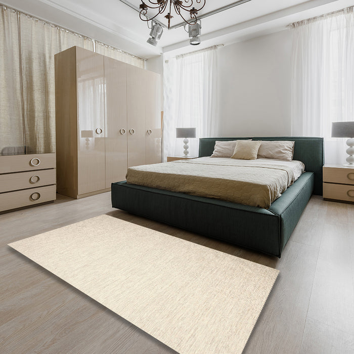 Contemporary Beige Solid Rug in a Bedroom, con1370