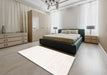 Contemporary Beige Solid Rug in a Bedroom, con1417