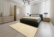 Contemporary Khaki Gold Solid Rug in a Bedroom, con1478