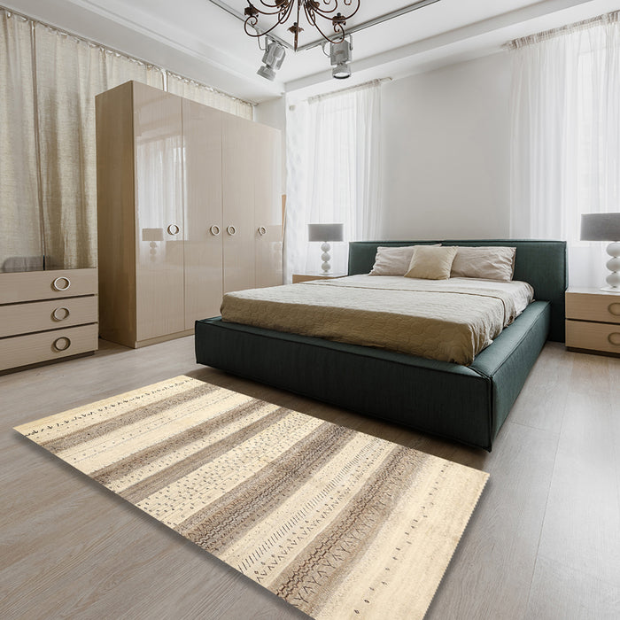 Contemporary Golden Blonde Gold Solid Rug in a Bedroom, con1611