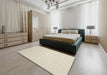 Contemporary Tan Brown Solid Rug in a Bedroom, con176