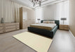 Contemporary Khaki Gold Solid Rug in a Bedroom, con178