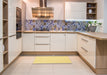 Contemporary Mustard Yellow Modern Rug in a Kitchen, con1885