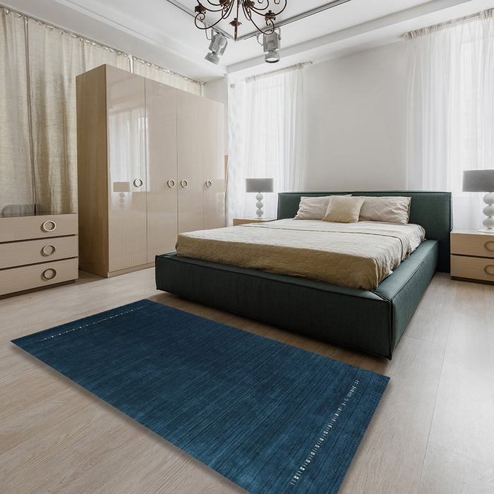 Contemporary Deep-Sea Blue Modern Rug in a Bedroom, con2025