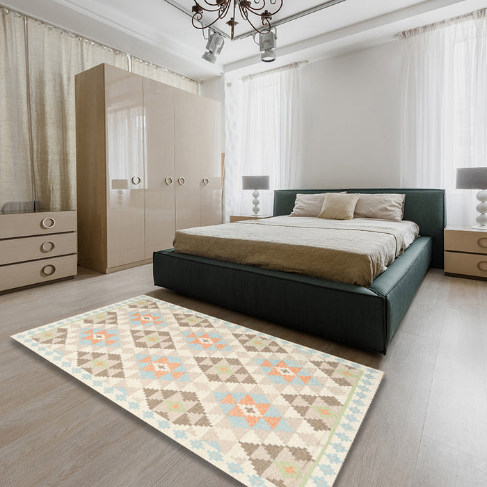 Contemporary Tan Brown Gold Southwestern Rug in a Bedroom, con2063