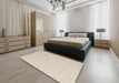 Contemporary Champagne Beige Solid Rug in a Bedroom, con2160