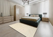 Contemporary Vanilla Gold Solid Rug in a Bedroom, con2401