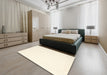 Contemporary Beige Solid Rug in a Bedroom, con2445