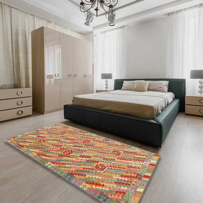 Contemporary Metallic Gold Southwestern Rug in a Bedroom, con2531