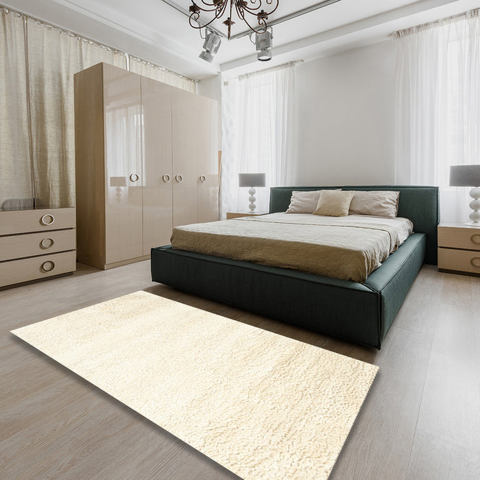 Contemporary Vanilla Gold Solid Rug in a Bedroom, con2560