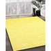 Contemporary Yellow Modern Rug in Family Room, con257