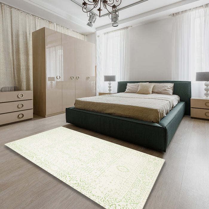 Contemporary Tan Brown Gold Solid Rug in a Bedroom, con260