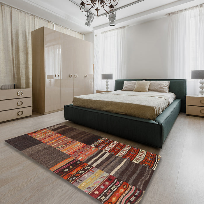 Contemporary Dark Gold Brown Southwestern Rug in a Bedroom, con2690