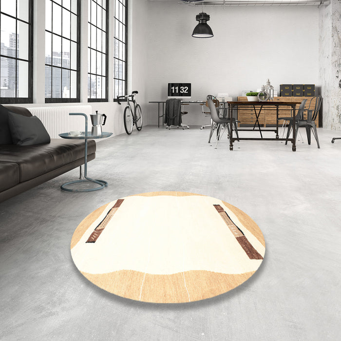 Round Contemporary Beige Solid Rug in a Office, con269