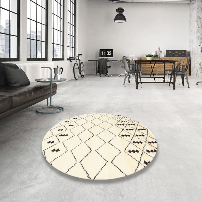 Round Contemporary Beige Solid Rug in a Office, con2753