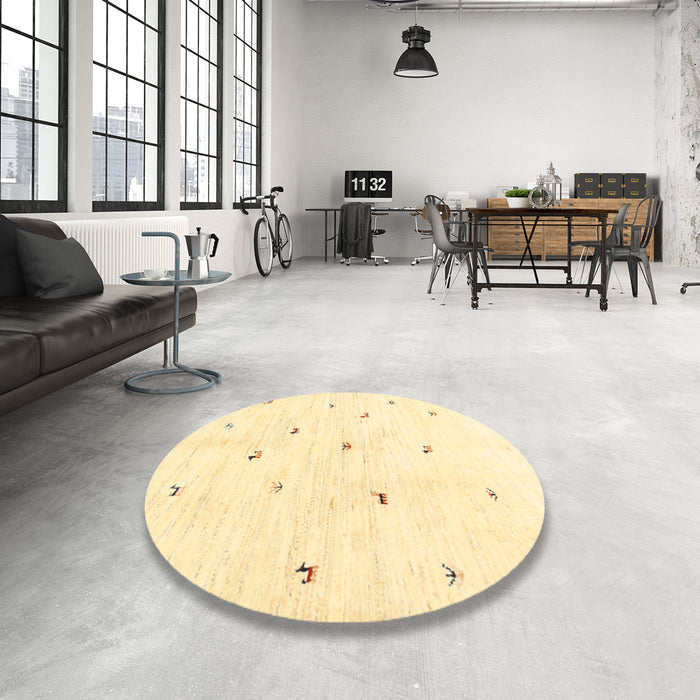 Round Contemporary Mustard Yellow Solid Rug in a Office, con2840