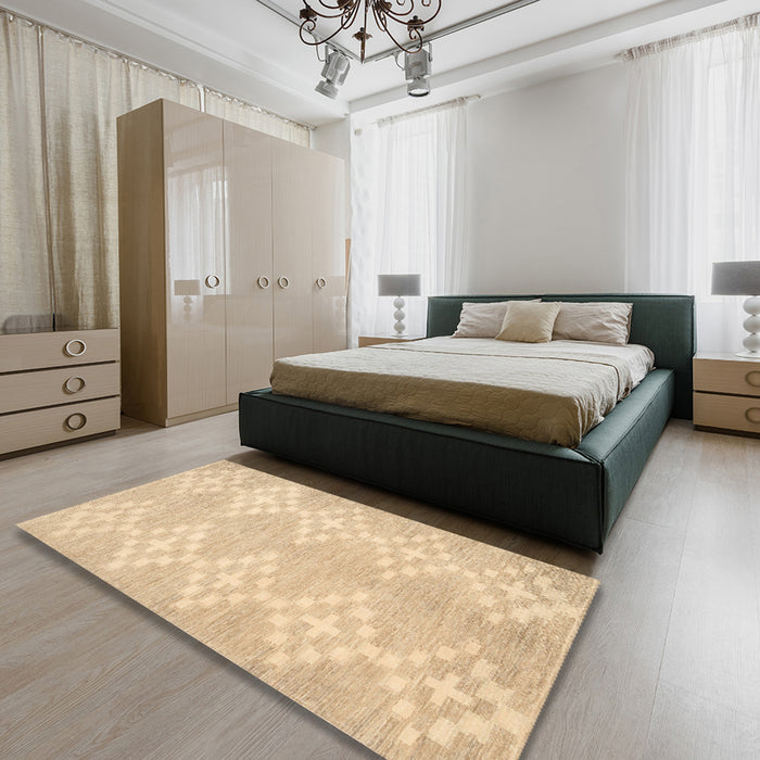 Contemporary Brown Gold Solid Rug in a Bedroom, con385