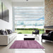 Square Contemporary Pink Modern Rug in a Living Room, con425