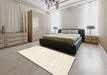 Contemporary Blanched Almond Beige Solid Rug in a Bedroom, con465