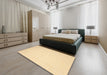 Contemporary Sun Yellow Solid Rug in a Bedroom, con511