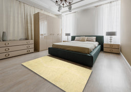 Contemporary Sun Yellow Solid Rug in a Bedroom, con523