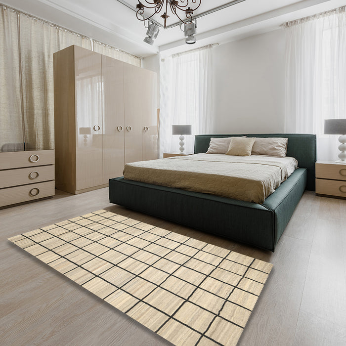 Contemporary Khaki Gold Solid Rug in a Bedroom, con552