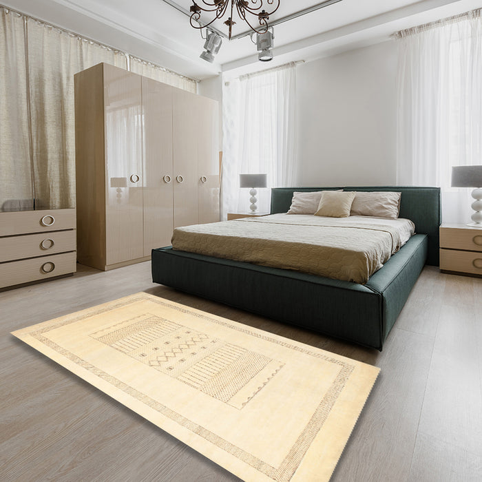 Contemporary Golden Blonde Gold Solid Rug in a Bedroom, con603