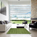 Square Contemporary Green Modern Rug in a Living Room, con60