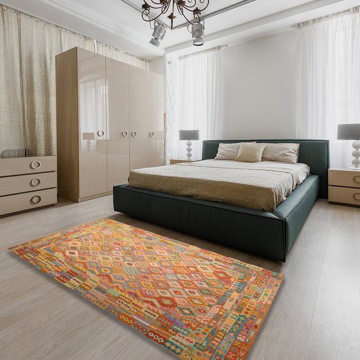 Contemporary Orange Southwestern Rug in a Bedroom, con687
