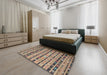 Contemporary Brown Southwestern Rug in a Bedroom, con822