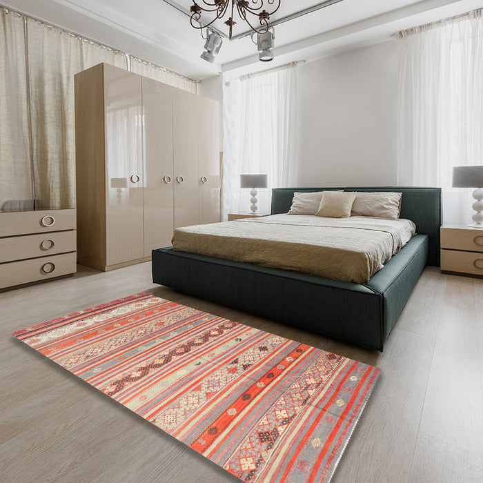 Contemporary Orange Southwestern Rug in a Bedroom, con873