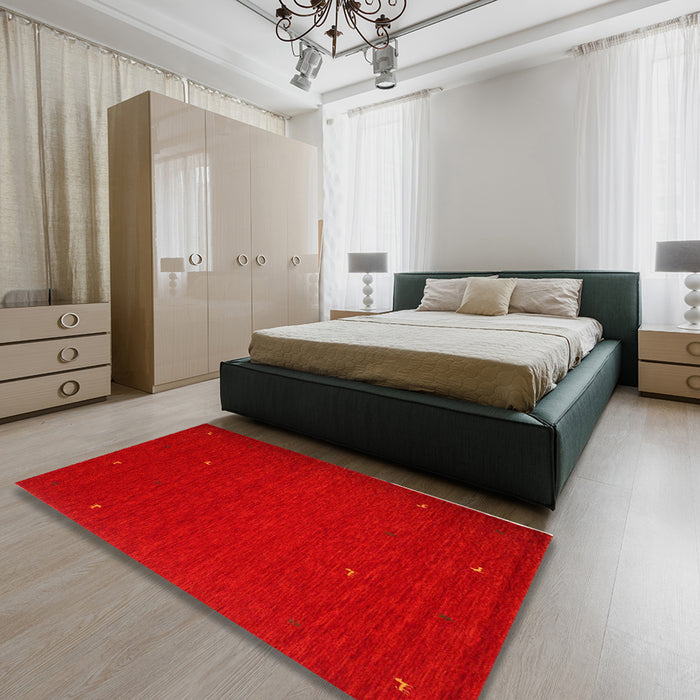 Contemporary Sunrise Orange Modern Rug in a Bedroom, con896